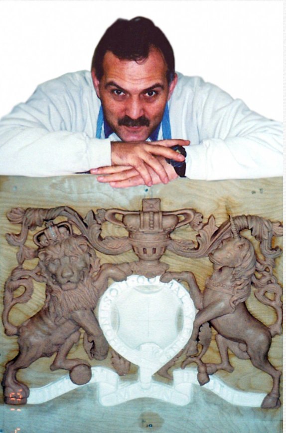 Vyacheslav (Nick) Dohuzya with the Lion and Unicorn clay model